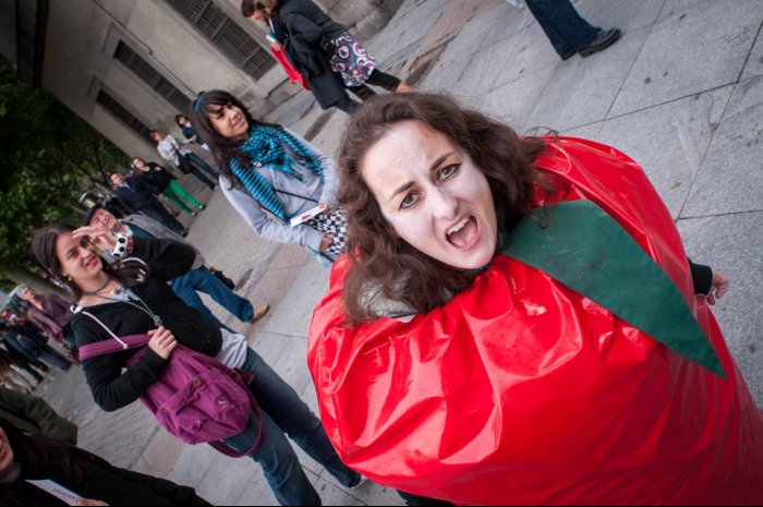 Madrid - A woman calls for attention in Plaza de Atocha